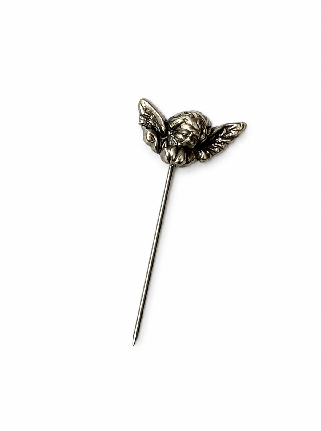 Angel-shaped counting pinon a white background