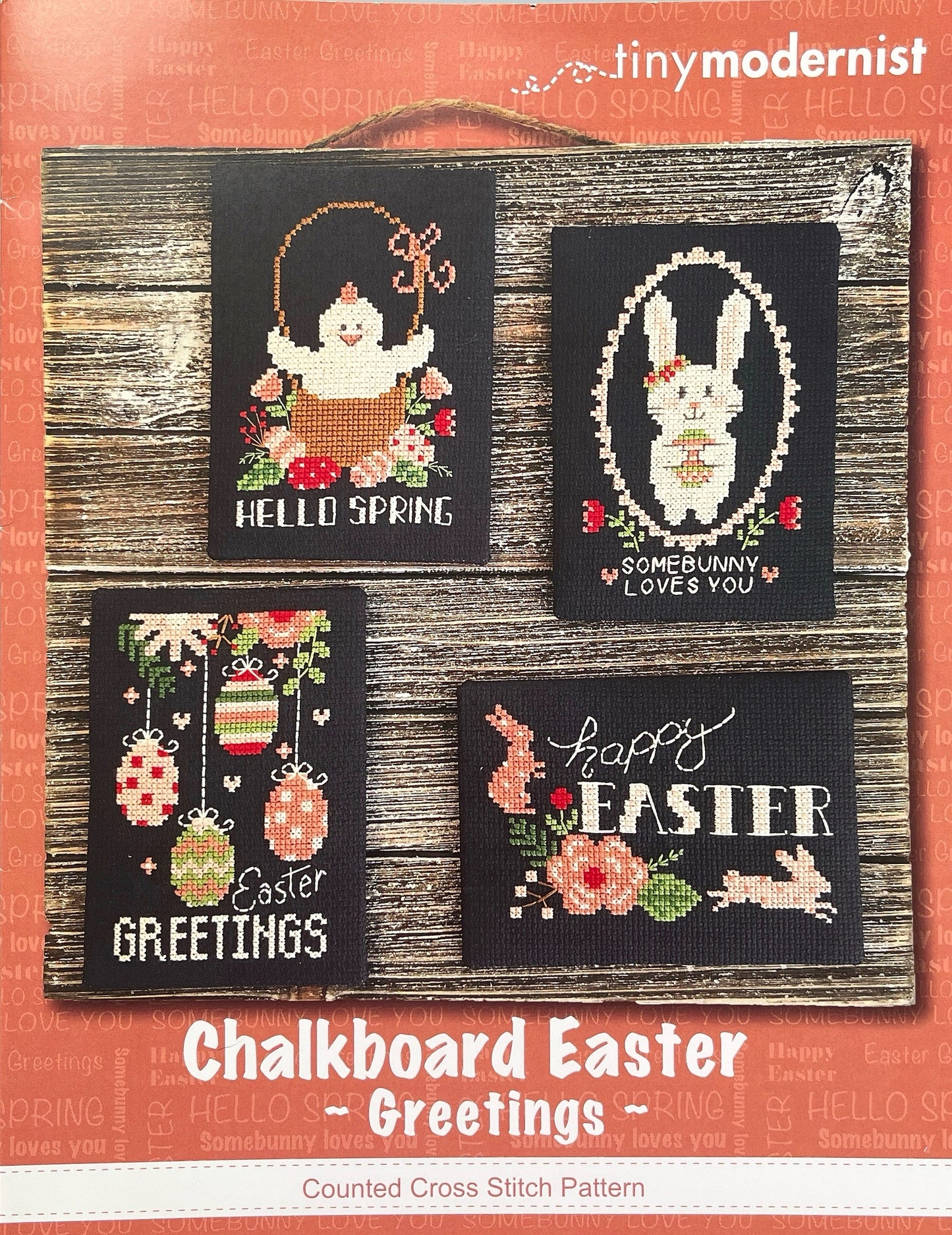 Chalkboard Easter greetings cross-stitch patterns on a wooden background with 'tiny modernist' branding.