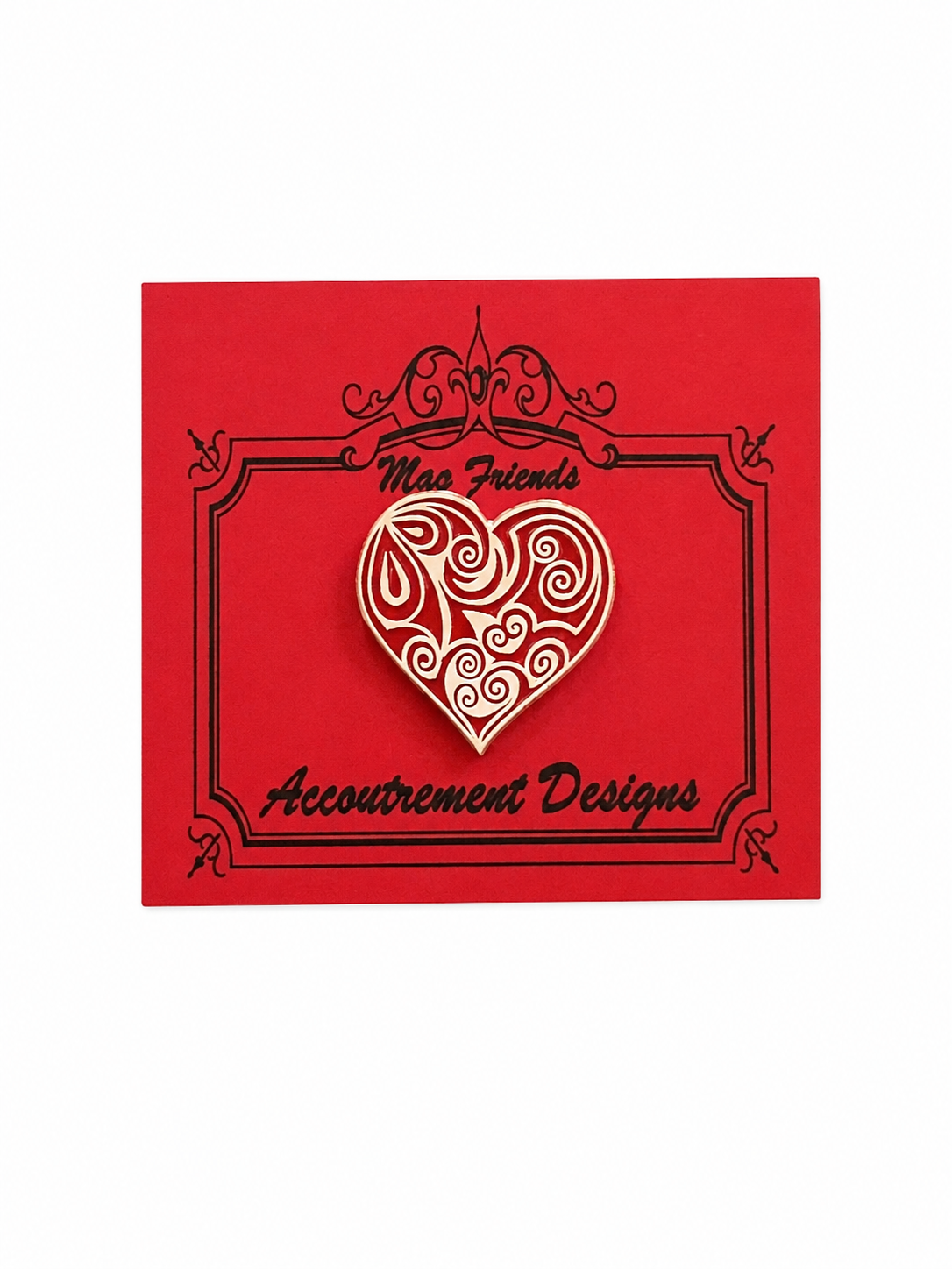 Red card with a heart design and 'Accoutrement Designs' text on a white background