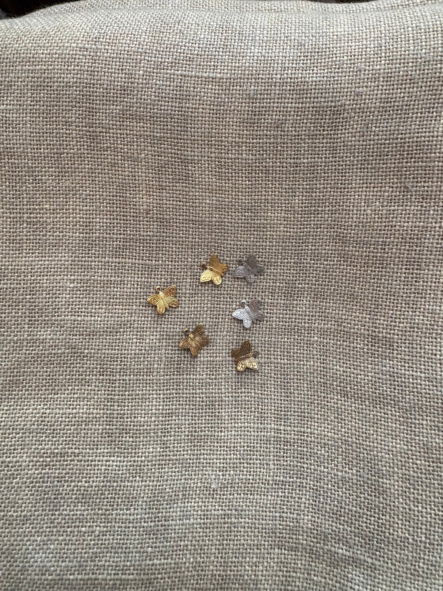 Small butterfly charms from By Jupiter!