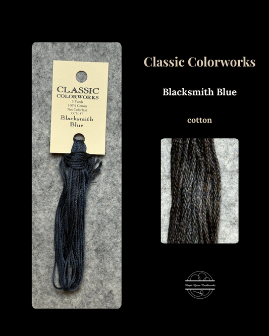 Blacksmith Blue by Classic Colorworks cotton thread with packaging and close-up on a black background