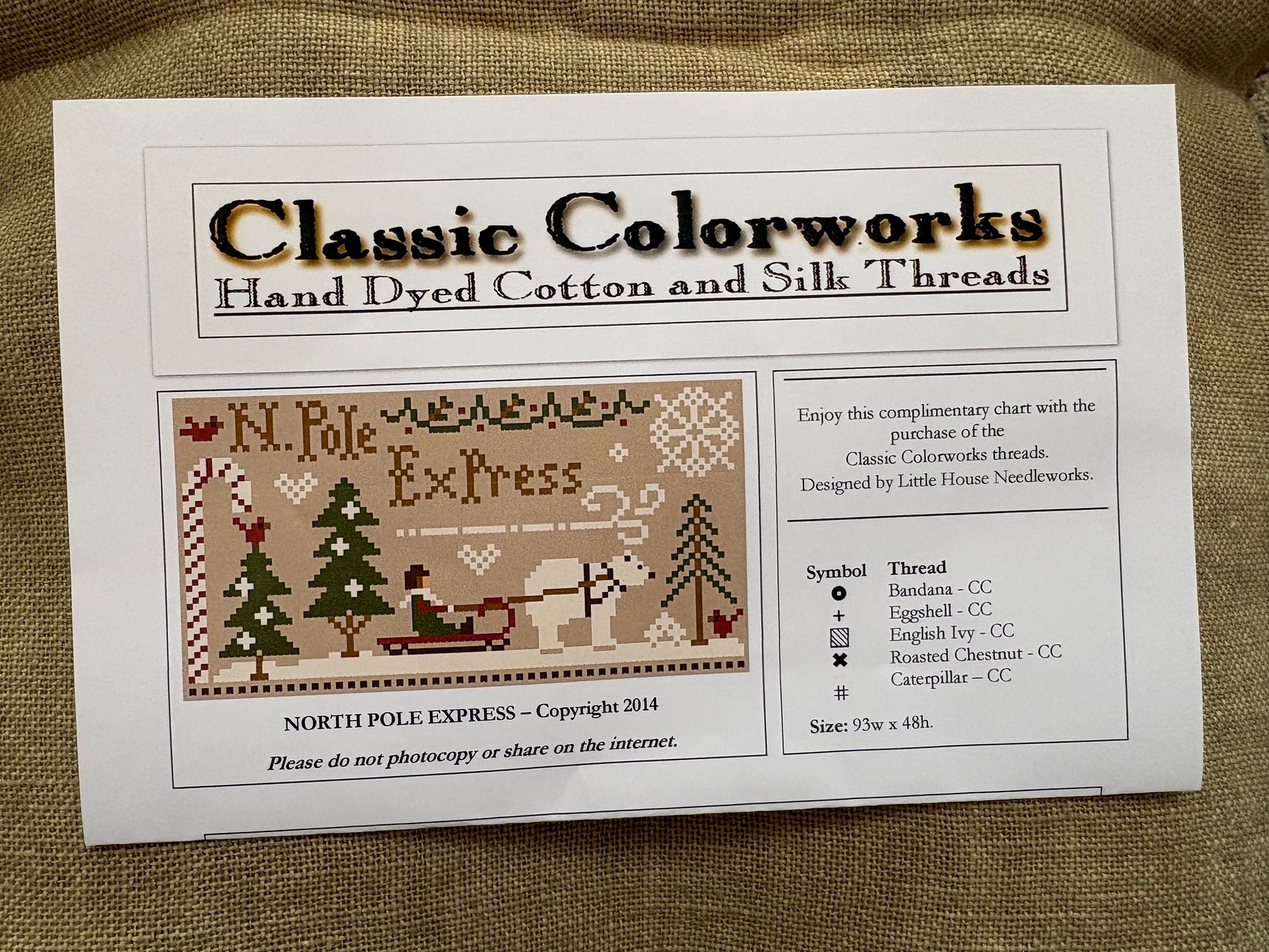 Brochure for Classic Colorworks hand dyed cotton and silk threads featuring a North Pole Express design.