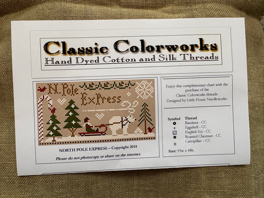 Brochure for Classic Colorworks hand dyed cotton and silk threads featuring a North Pole Express design.
