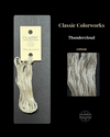  skein of yarn with packaging and close-up on a black background, featuring 'Classic Colorworks Thundercloud' label.