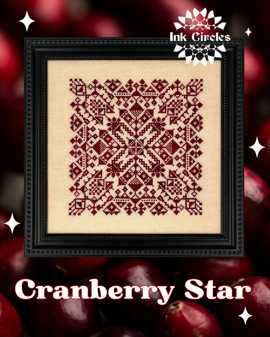Framed cross-stitch pattern with 'Cranberry Star' design on a red berry background, featuring the brand 'Ink Circles'.