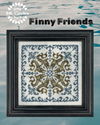 Framed cross-stitched design with 'Finny Friends' text and Ink Circles logo.