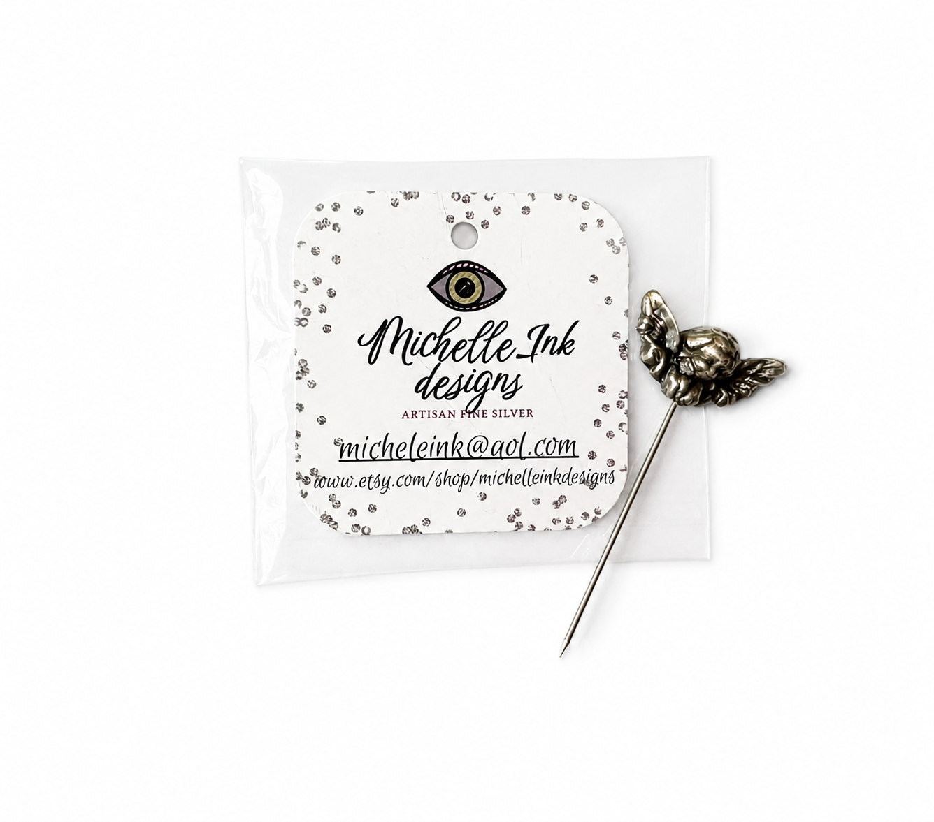 Silver angle-shaped counting pin with a branded card with 'Michelle Ink designs' branding.