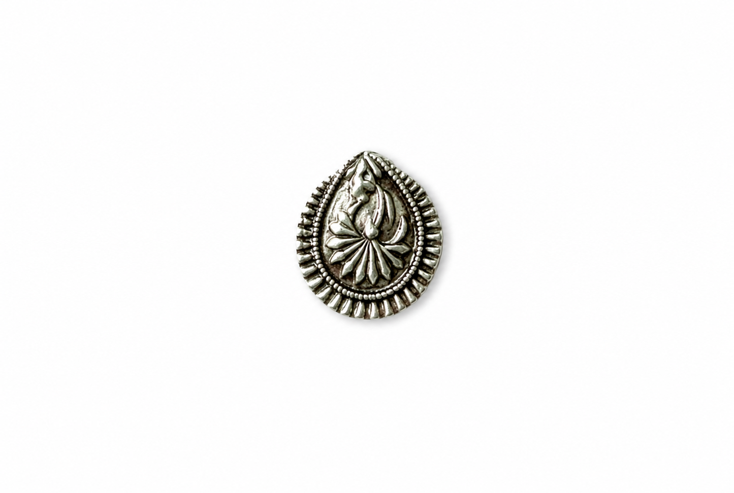Silver teardrop-shaped decorative element on a white background