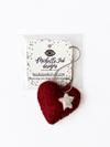Heart-shaped pin cushion with star detail on a Michelle Ink Designs card
