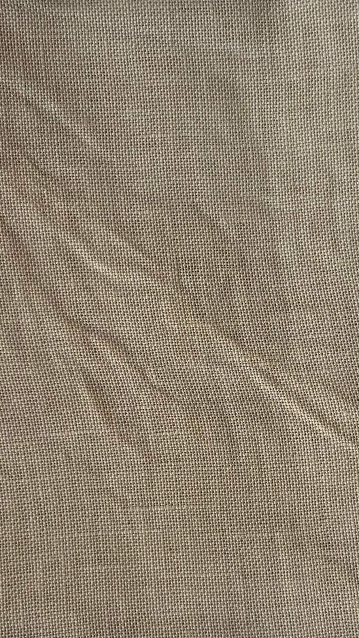 Close-up of textured brown fabric known as R&R Creme Brulee 32ct Linen