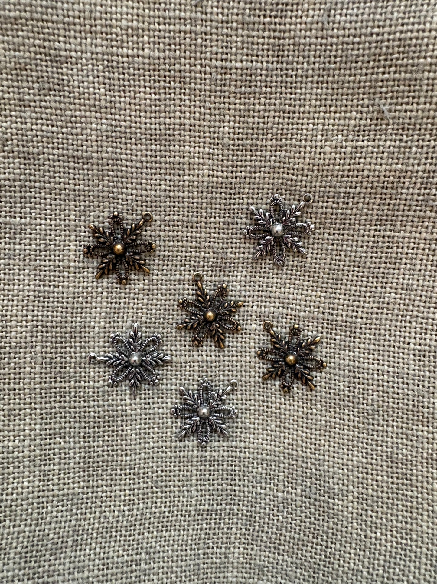 Snowflakes in silver and antique gold