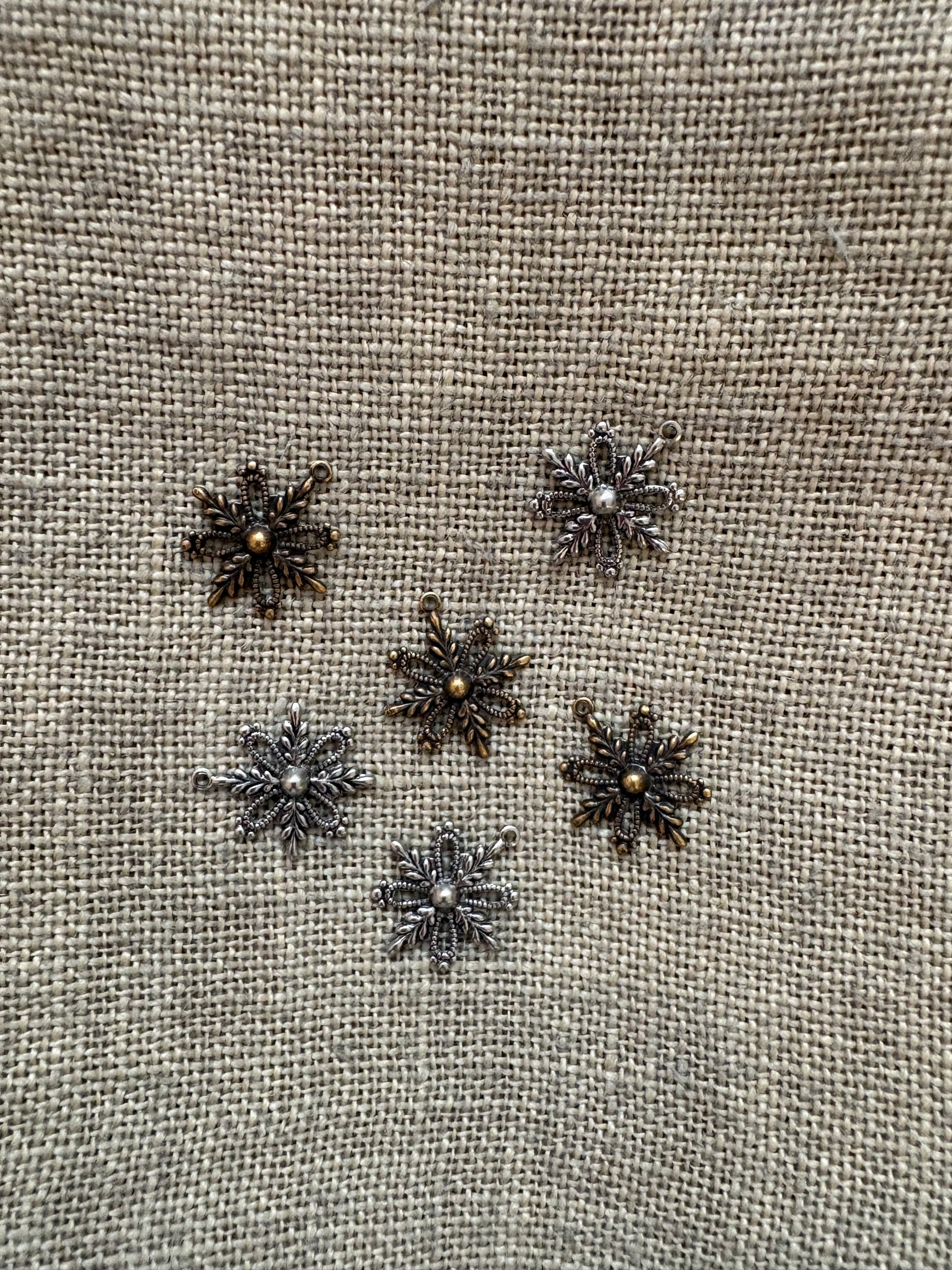 Snowflakes in silver and antique gold