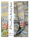 Two cross-stitch samplers with intricate patterns and text, one on a white background and the other on a wooden surface.