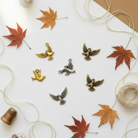 Dove charms on autumn background