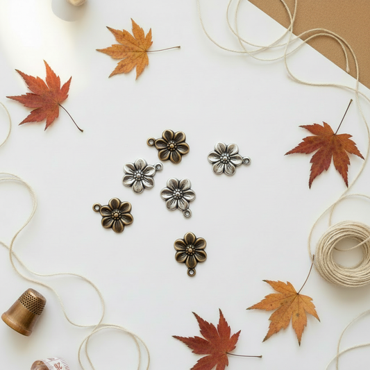 Flower charms on autumn background