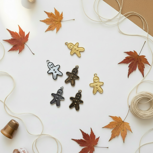 Gingerbread man charms on autumn background