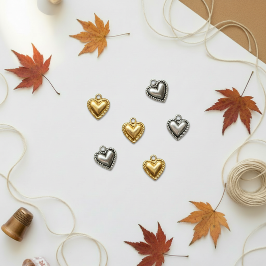 Heart charms on autumn background