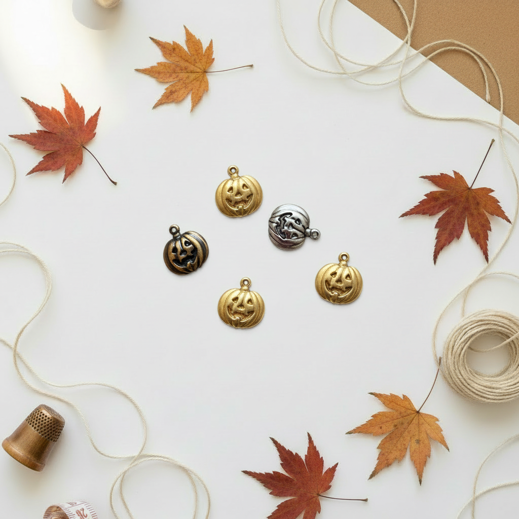 Jack-o'-lantern charms on autumn background