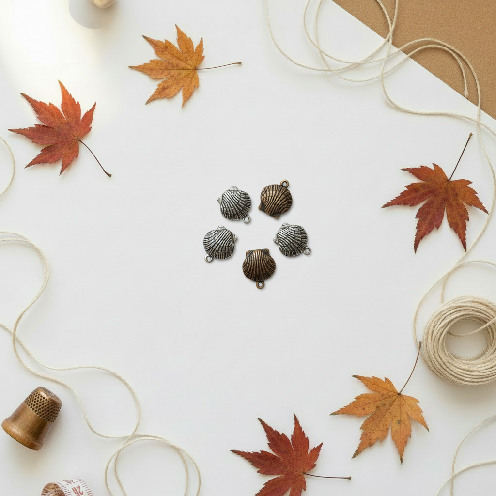 Seashell charms on autumn background