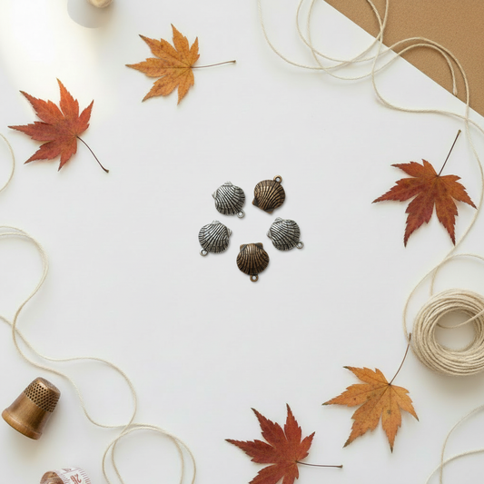 Seashell charms on autumn background