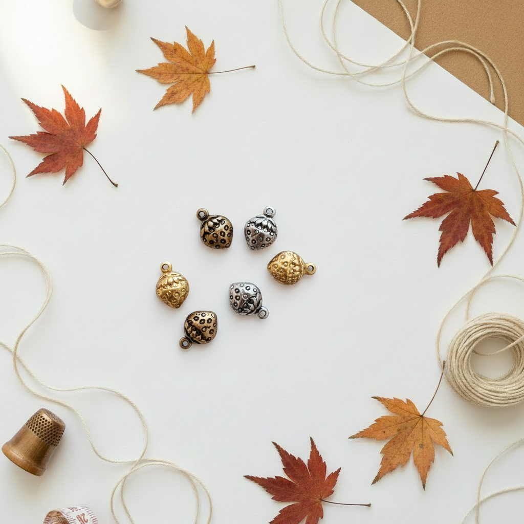 Strawberry charms on maple leaves background